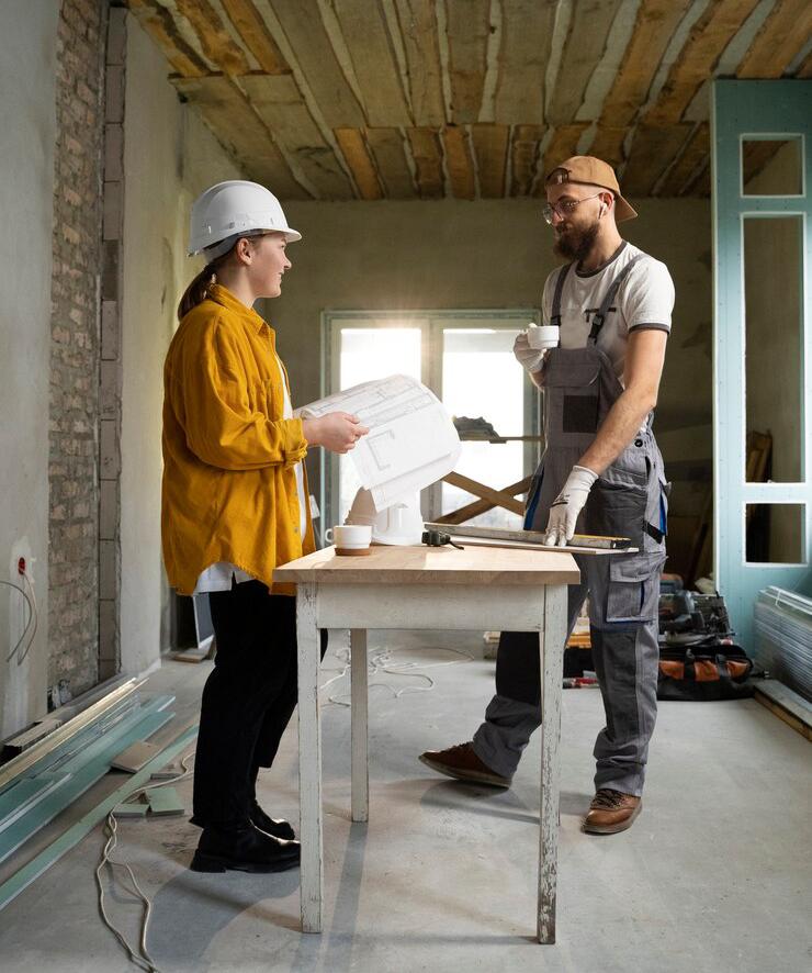 Professional home renovation contractors installing new flooring